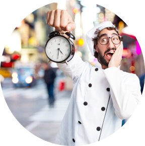 A cook with an alarm clock